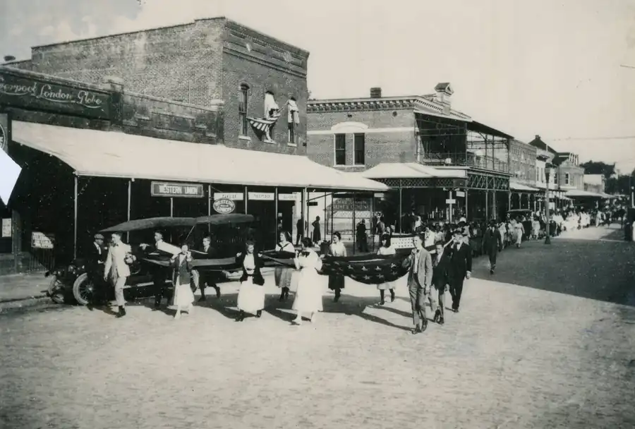 Historic photograph: 100 S. Woodland Boulevard, brick streetscape